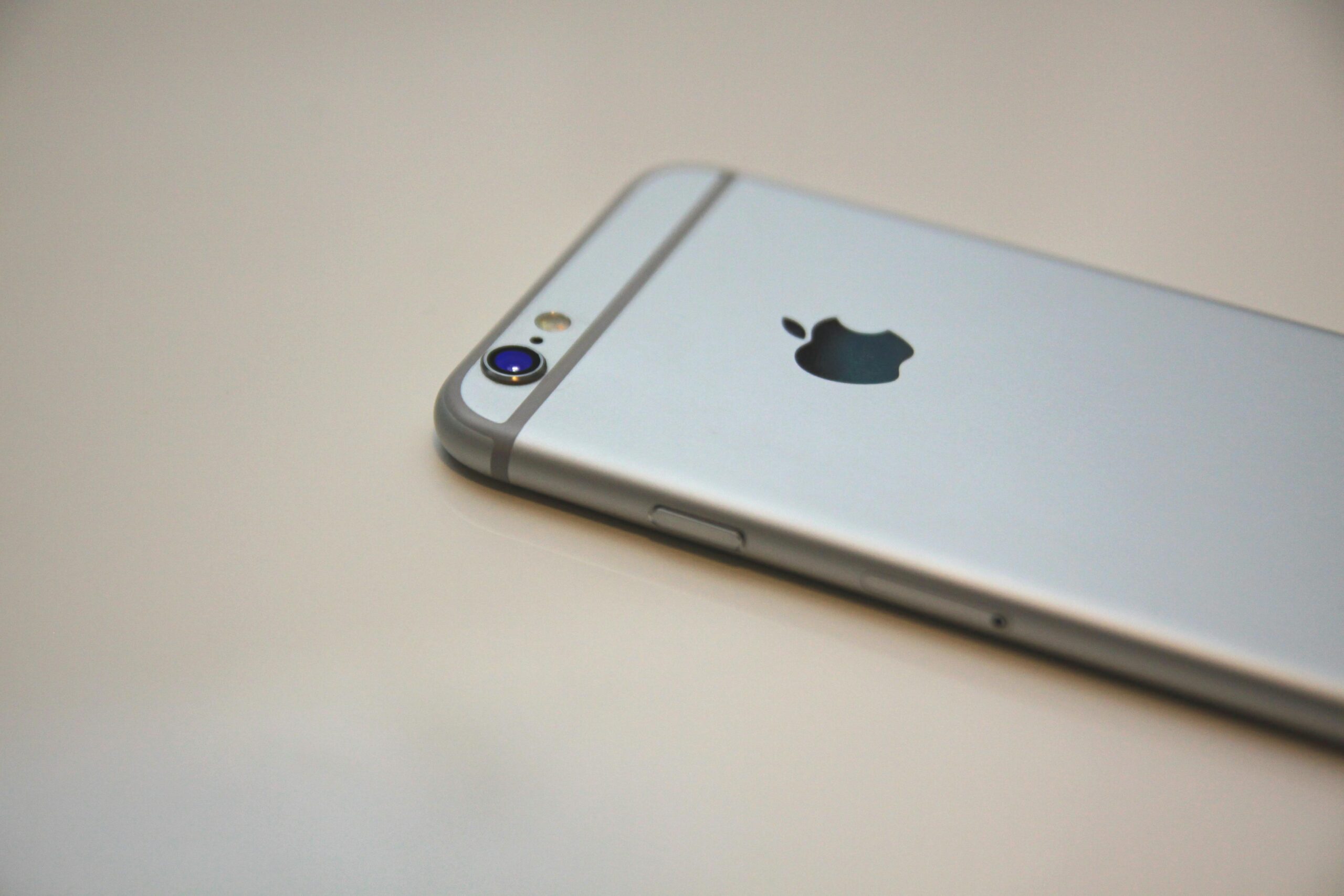 iPhone-Running-Slow-Speed-It-up-with-One-of-These-Tips-scaled.jpg Free Space Gray iPhone 6 Stock Photo